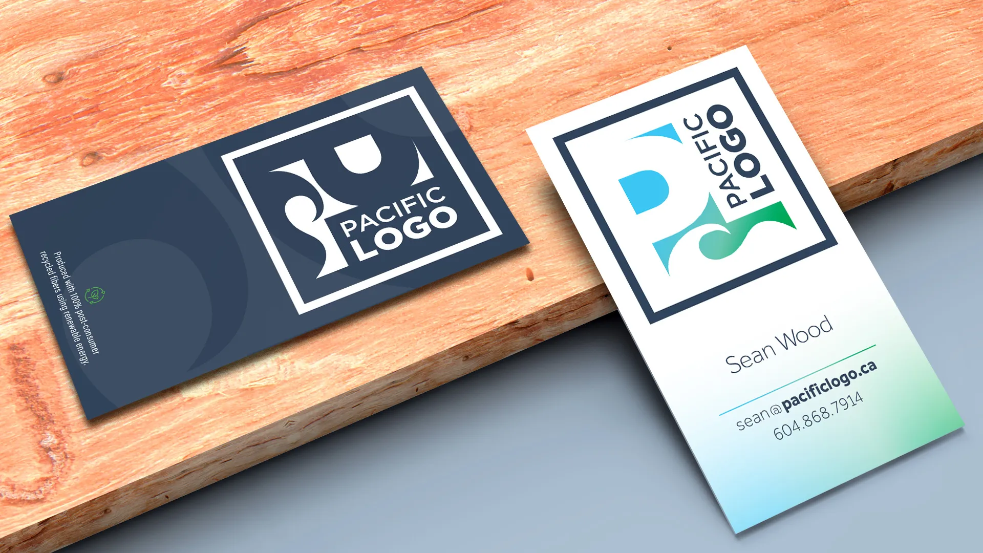 Pacific Logo business cards on reclaimed wood surface